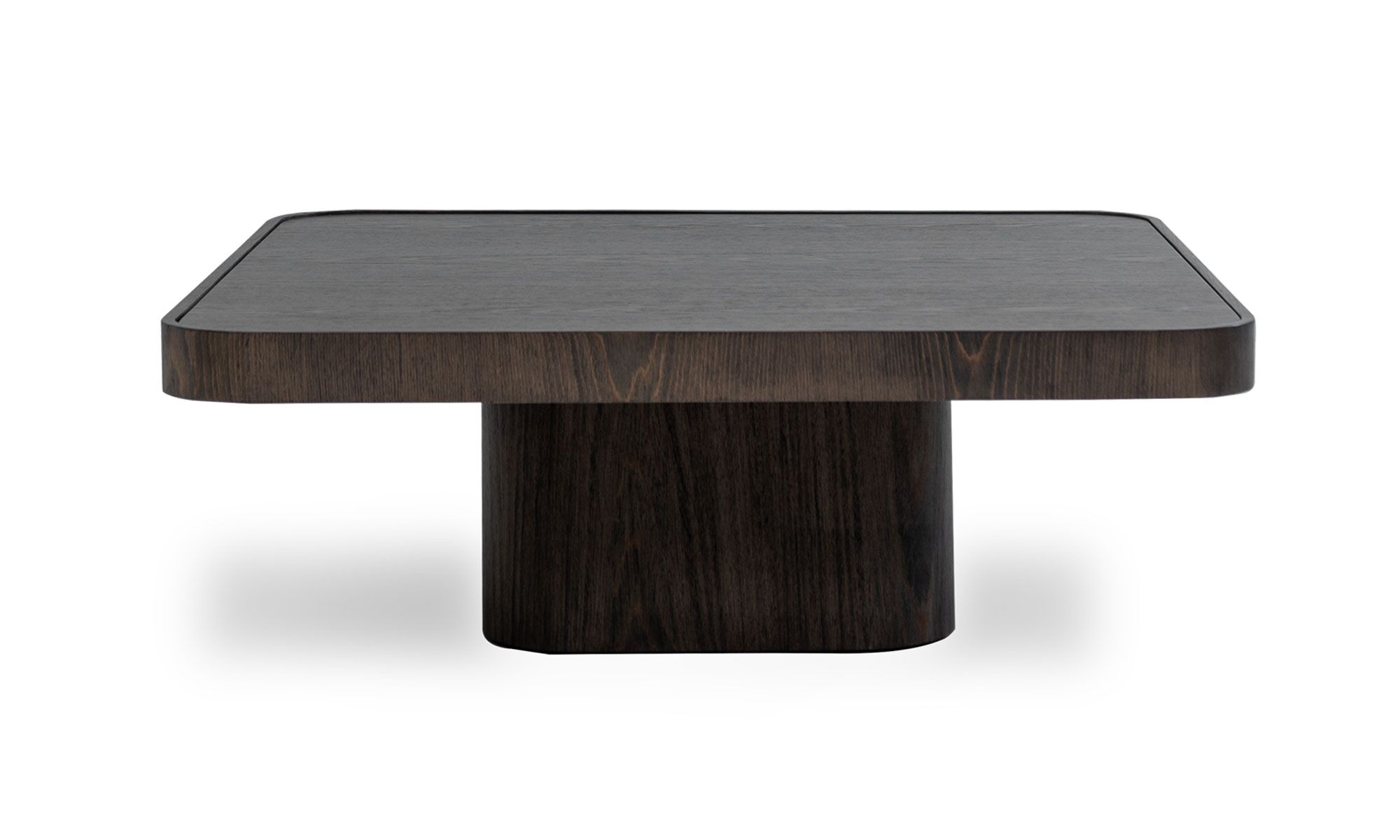 frente ROMA Vista frontal de la Mesa de Centro Roma Cuadrada de la marca Aristas. Un diseño minimalista y elegante de líneas curvas que presenta una base robusta en madera color Ceniza.