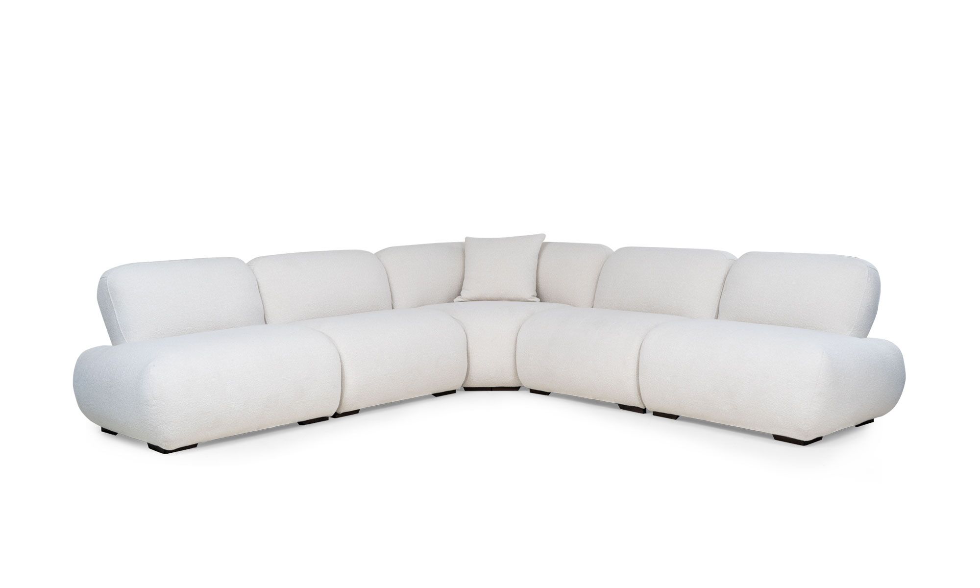 lado Sala en L Modular Emma Esquinero de la marca Aristas vista diagonal. El diseño presenta una configuración en forma de "L", con asientos amplios y acolchados en el color de tela Boucle Blanco.