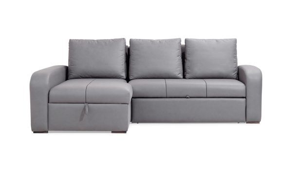Vista frontal de la Sala en L Sofá Cama Multifuncional Napoli Plumas de Aristas. Un diseño acolchado y elegante de líneas limpias, con asientos amplios y un acabado en tela suave de color neutro.