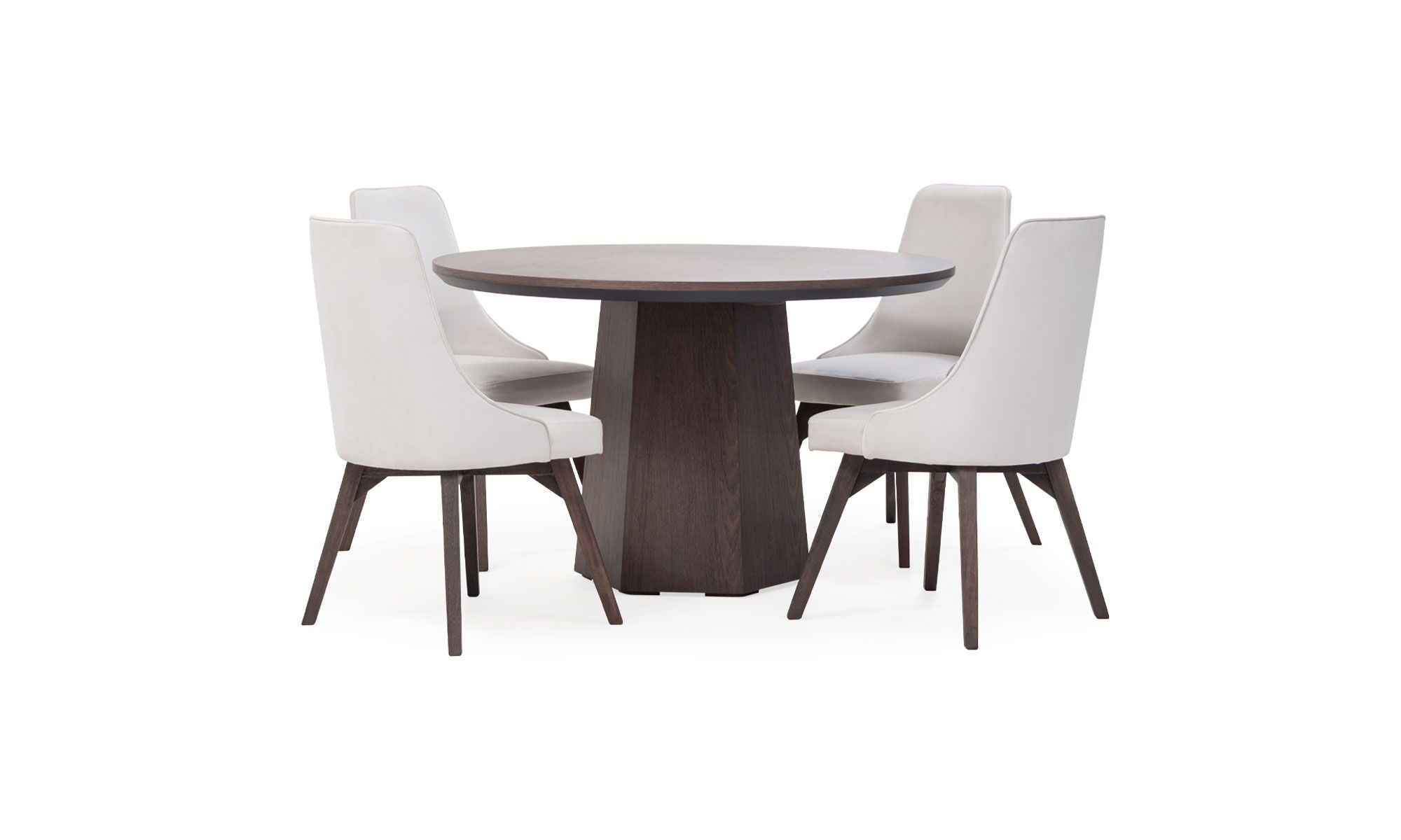 2.MESA-COMEDOR-MILANO-REDONDA-4-SILLAS-VELA Mesa Comedor Milano redonda con 4 sillas Vela de la marca Aristas, vista en X. La mesa presenta una superficie elegante, sostenida por una base central en madera color Chocolate. Las sillas Vela tienen un estilo elegante y un acabado en tela suave.