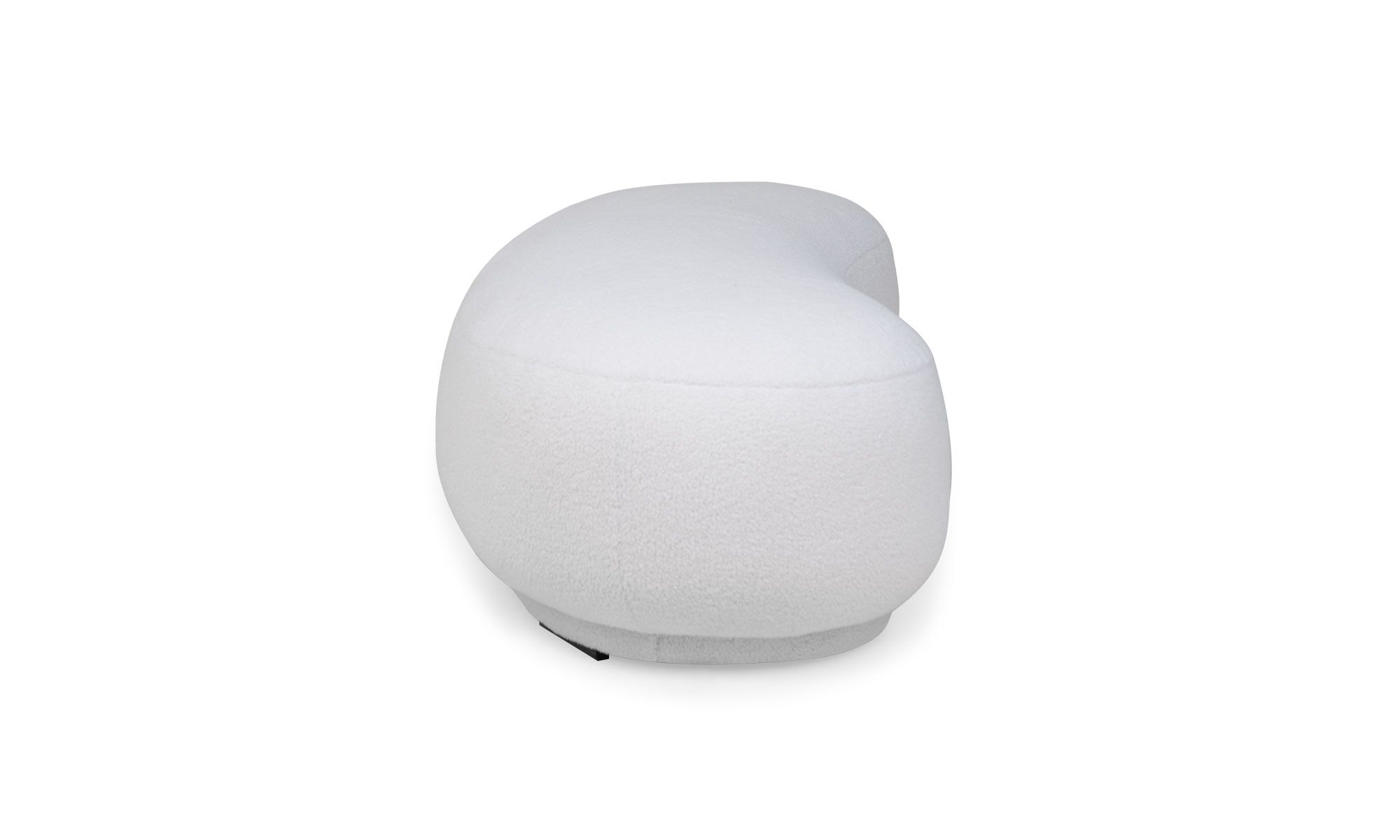 lado (2) Vista lateral del Puff Bolonia de la marca Aristas. Un diseño cilíndrico con una superficie lisa y acolchada en el color de tela Boucle Blanco.