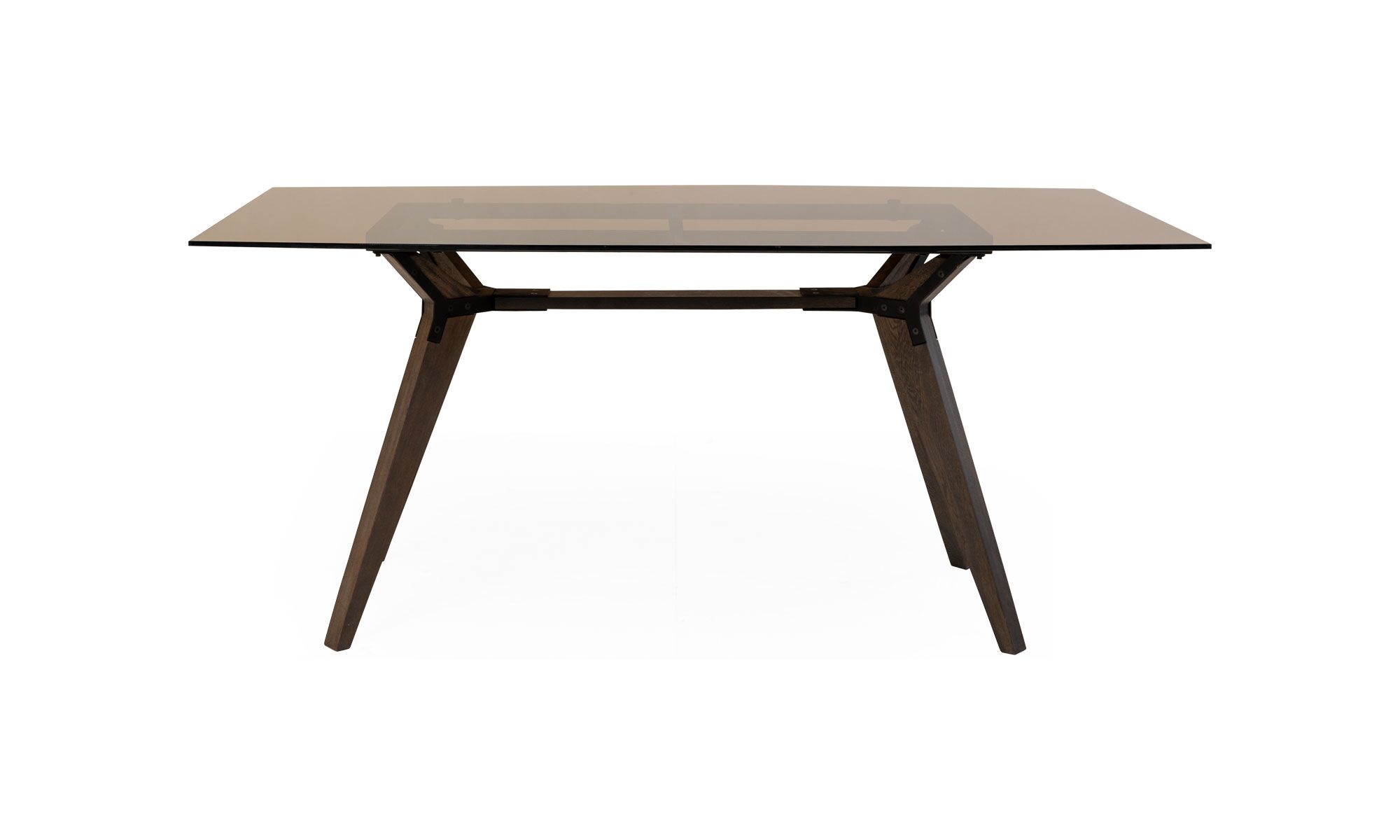 frente ATALANTA VIDRIO BARRIL Mesa Comedor Atalanta Vidrio 6 Puestos de la marca Aristas vista en perspectiva frontal. El diseño presenta una estructura moderna con una superficie de vidrio transparente rectangular, sostenida por una base robusta de madera color Ceniza.