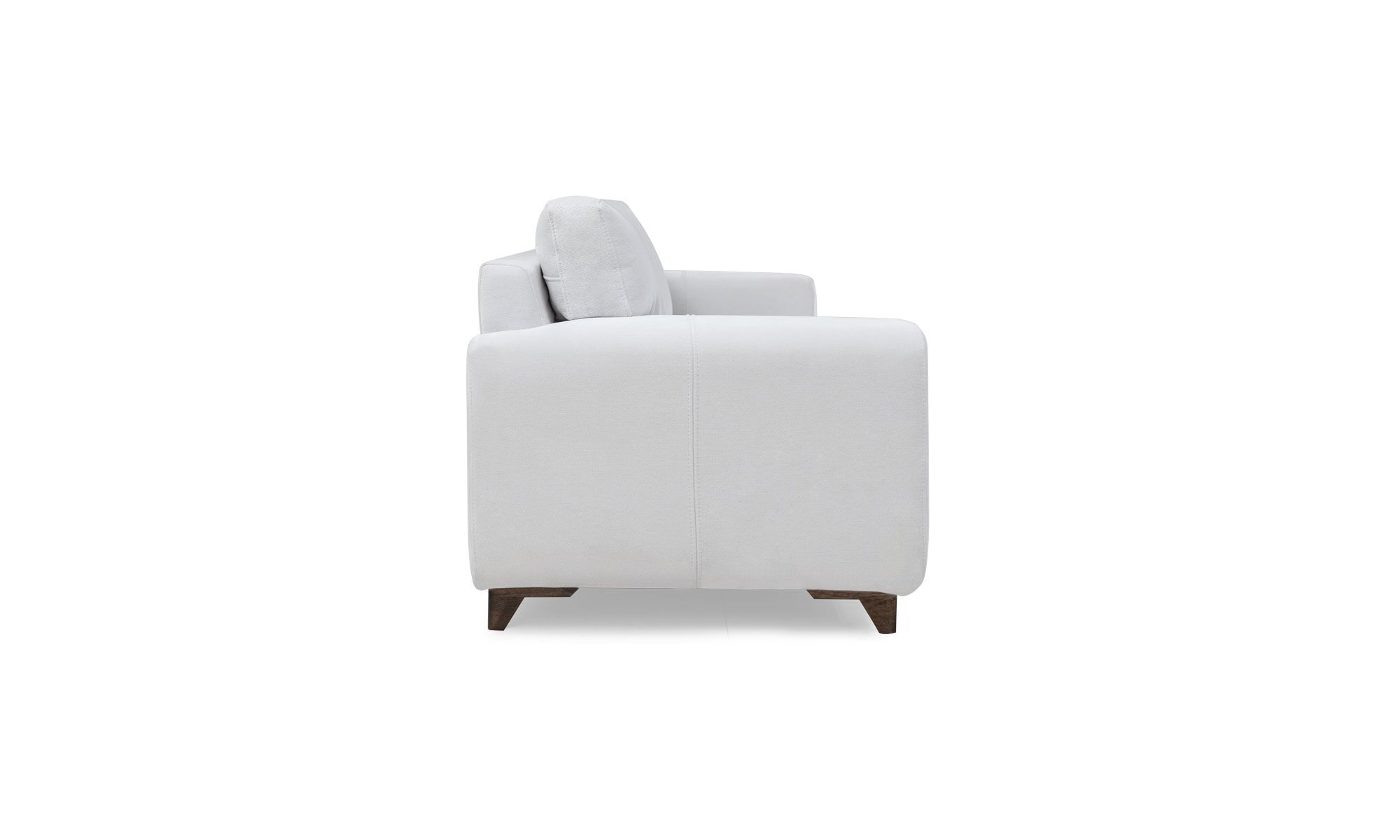 lado venetto Vista lateral del Sofá Venetto de la marca Aristas. Presenta un diseño elegante y moderno con cojines amplios, respaldo bajo y patas delgadas que elevan ligeramente la estructura.