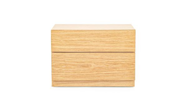 Vista frontal del Nochero Monet de la marca Aristas. Su diseño elegante y minimalista cuenta con una estructura sólida en madera color Escandinavo.
