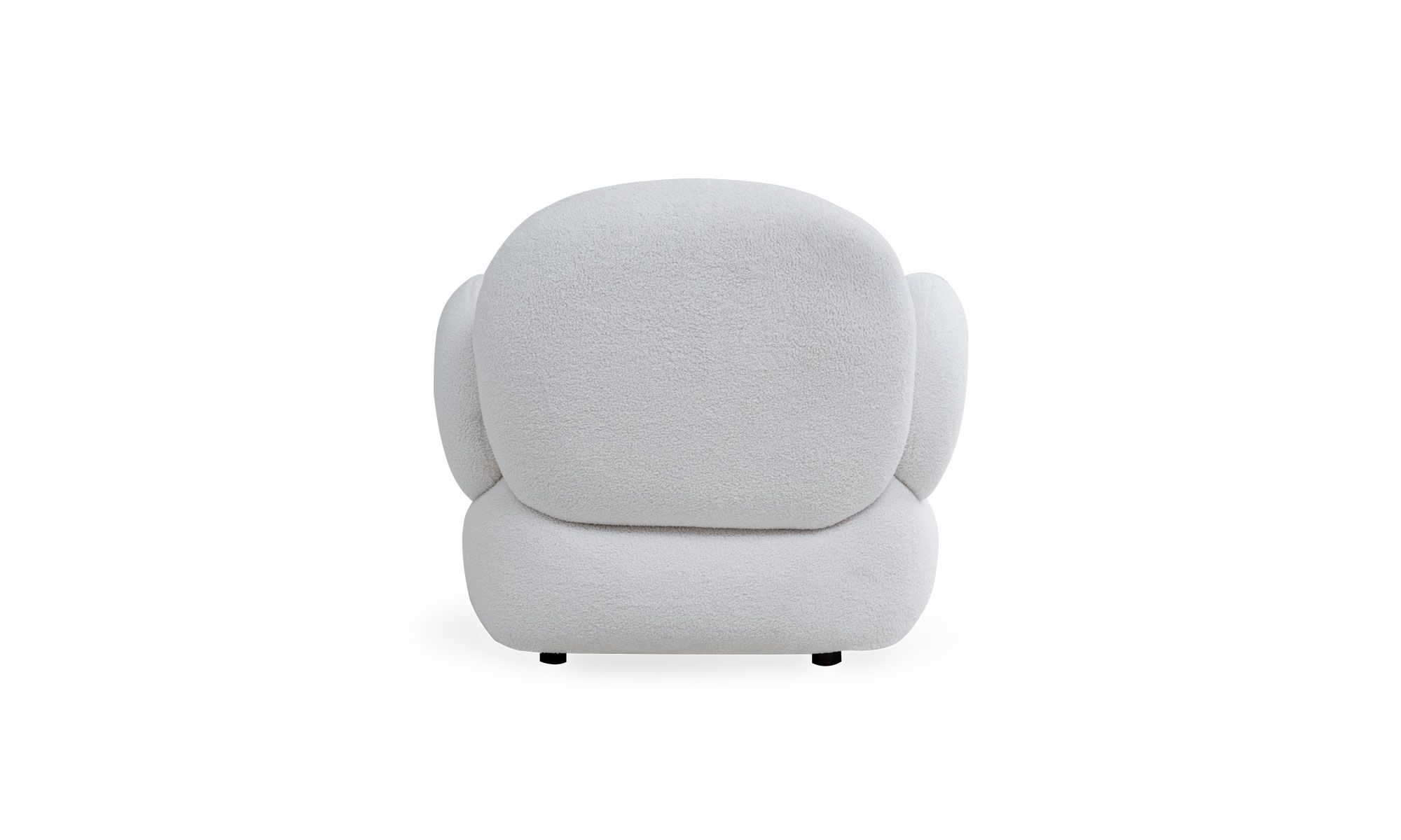 parte-trasera NIZA Vista posterior de la poltrona Niza de la marca Aristas. Un diseño moderno y elegante, con un respaldo acolchado ligeramente inclinado y brazos amplios en el color de tela Boucle Blanco.