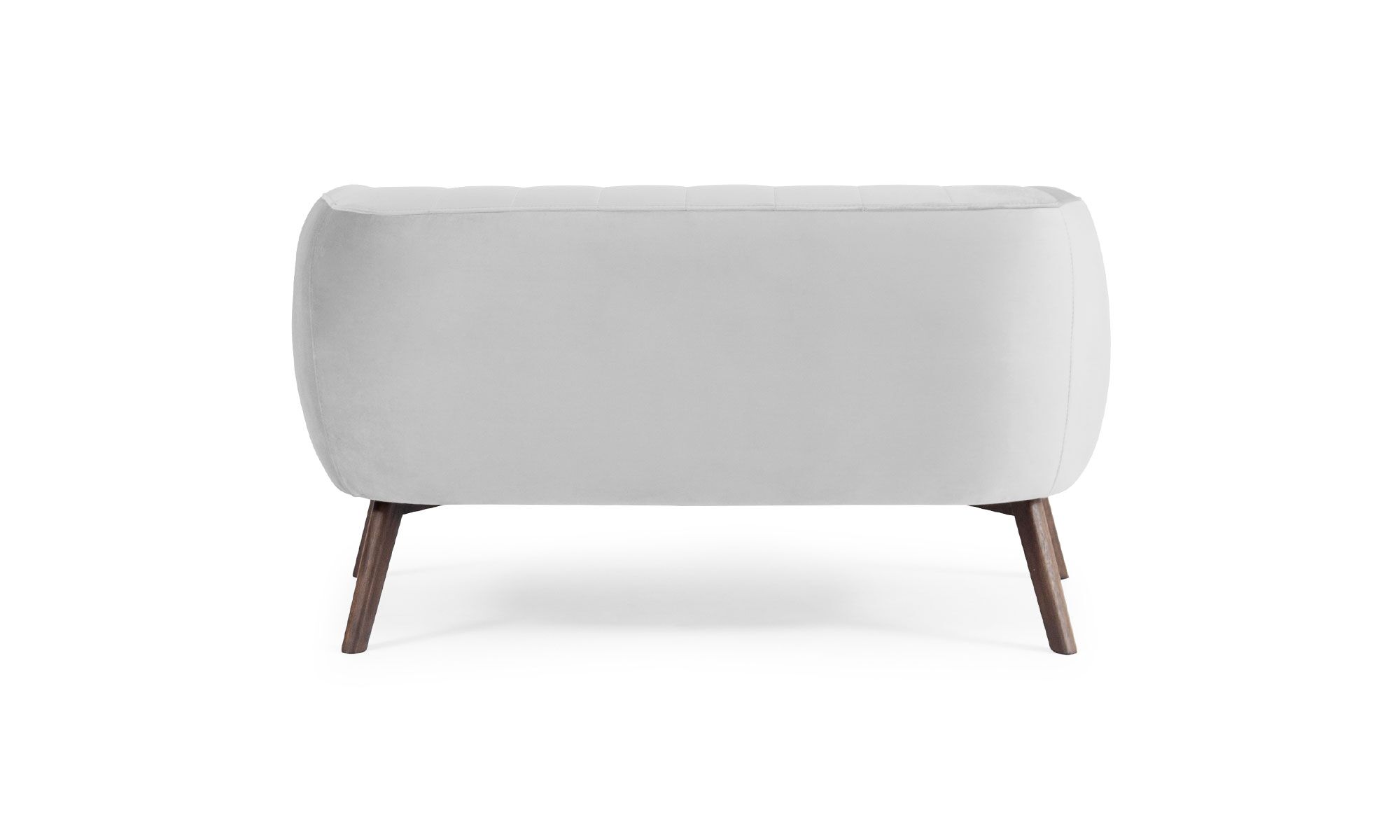 Sofá Kaira Espalda Vista posterior del Sofá Kaira de Aristas. Un diseño de líneas limpias y elegantes, con un tapizado en tela de tono neutro.