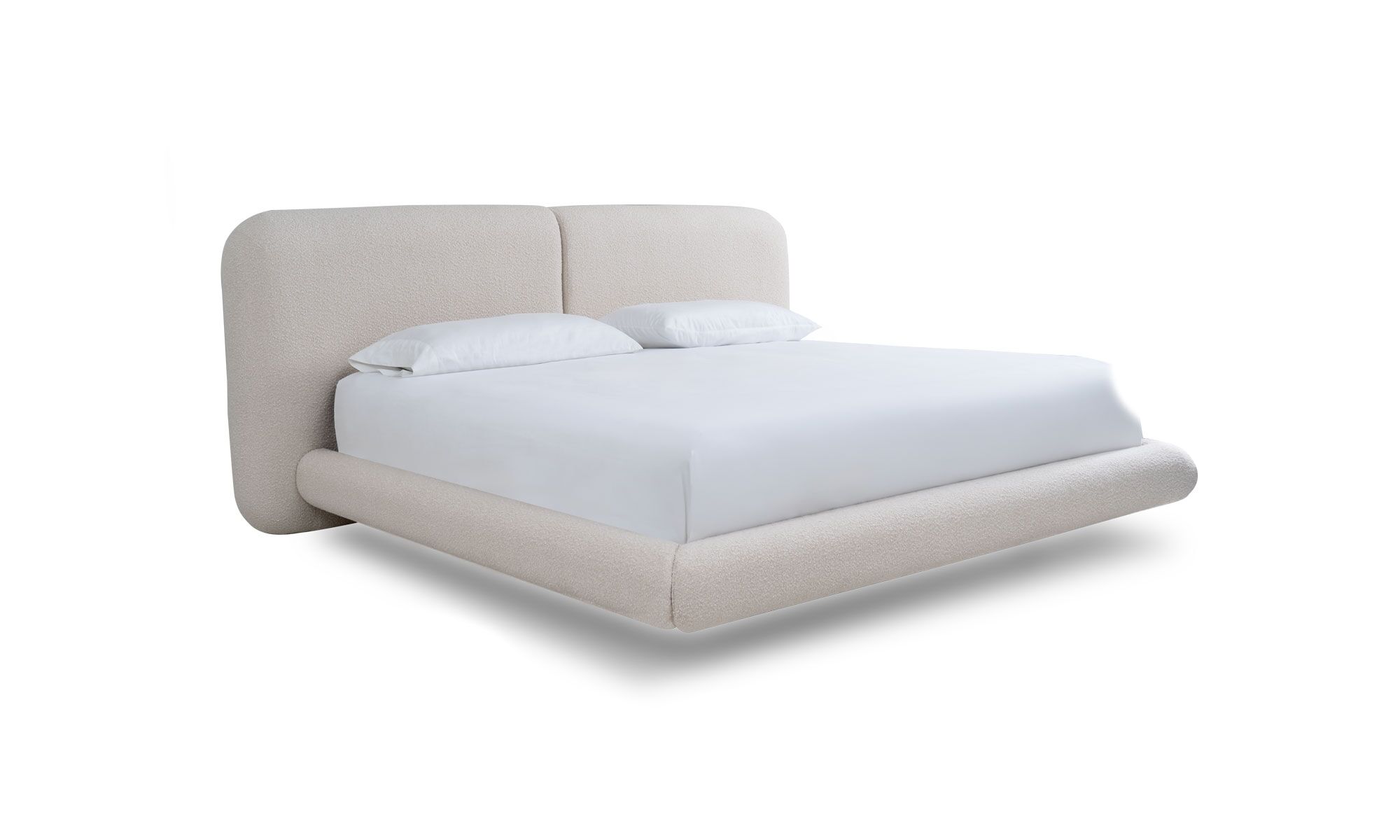 3,4 MILAN Vista diagonal de la Cama Milán de la marca Aristas. Un diseño elegante y sofisticado de líneas curvas, con un cabecero amplio y acabado en tela suave.