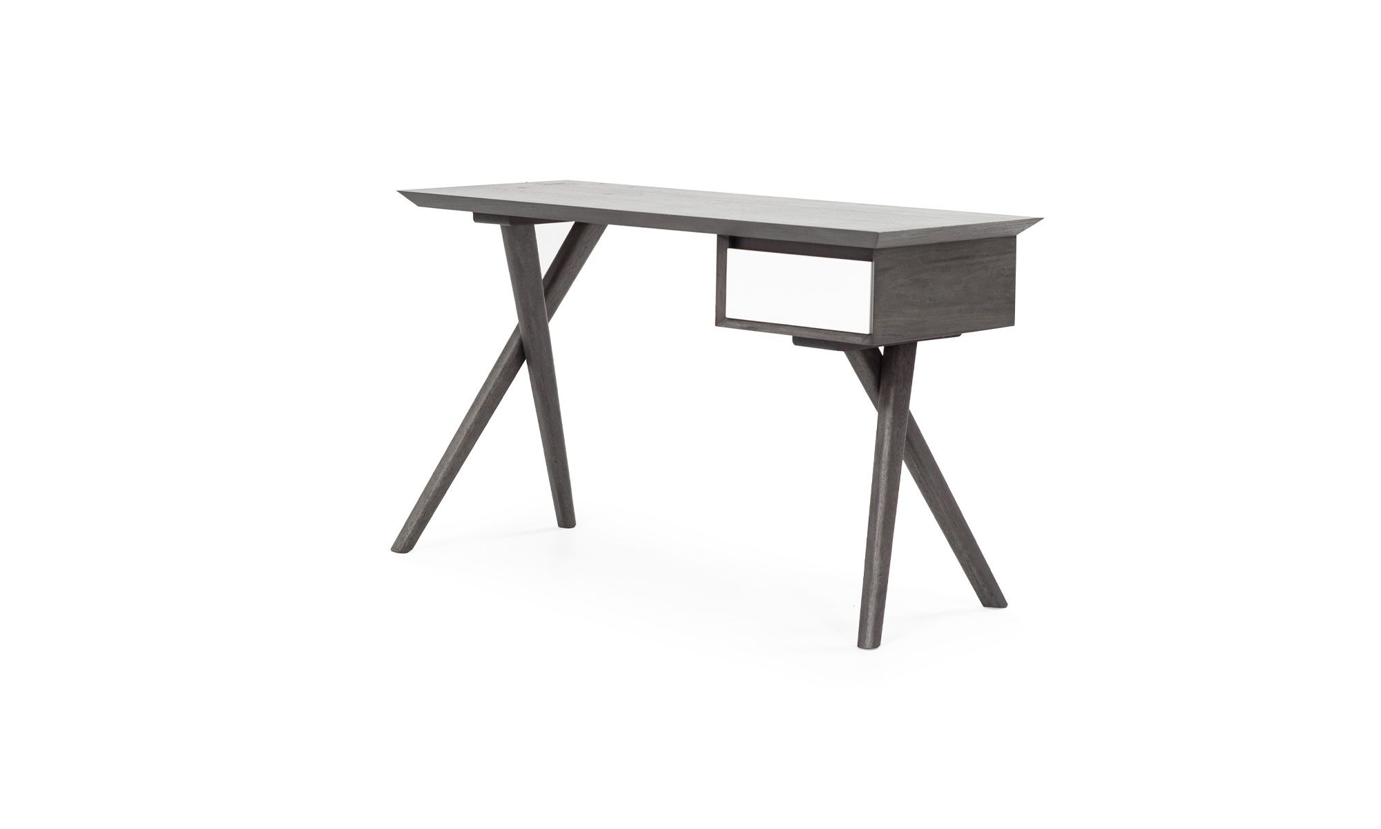 2.Escritorio-Xenia Escritorio Xenia de la marca Aristas, visto en perspectiva diagonal. Un diseño elegante en madera color Ceniza, con una superficie rectangular lisa y un cajón integrado.
