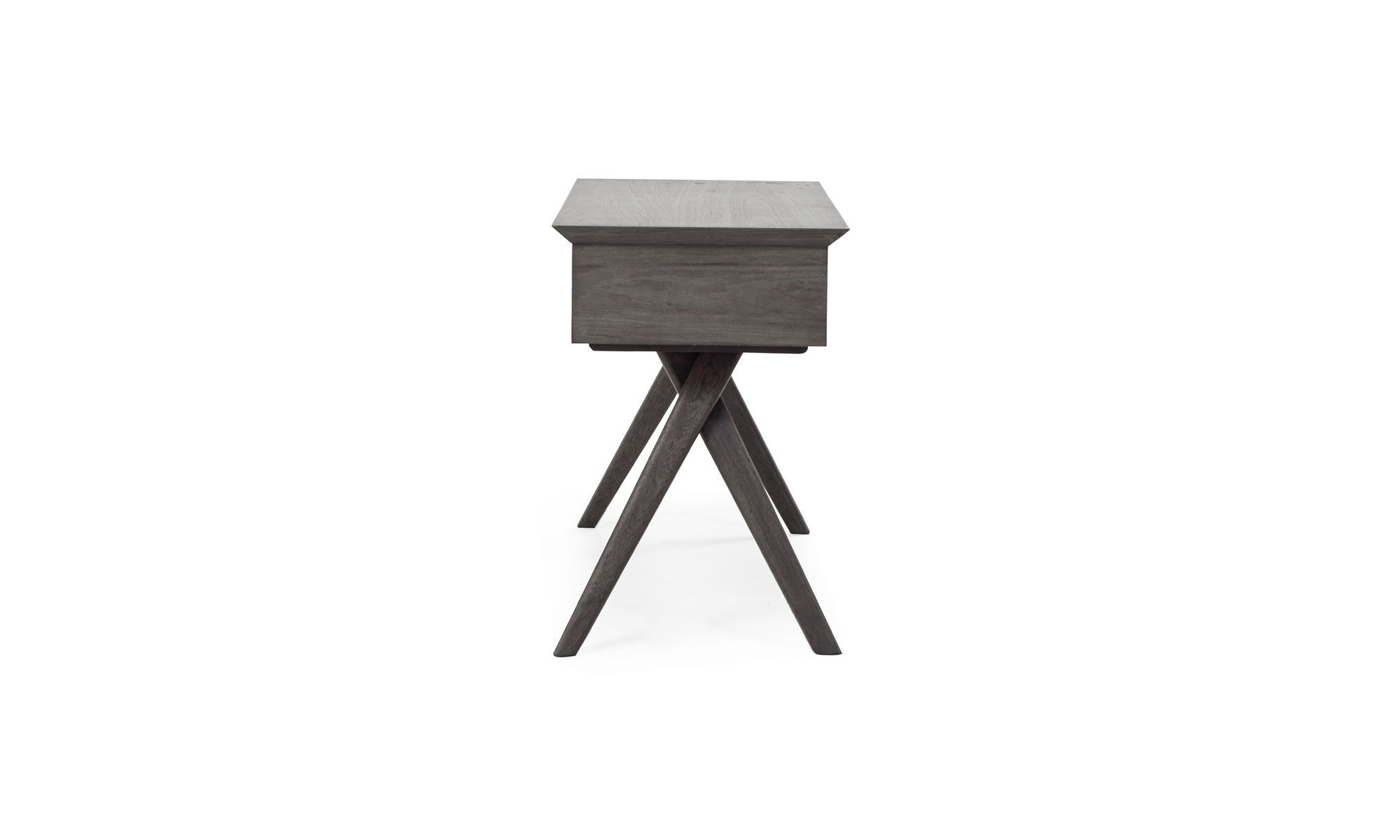 3.Escritorio-Xenia Escritorio Xenia de la marca Aristas, visto en perspectiva lateral. Un diseño moderno y elegante en madera color Ceniza, con una superficie rectangular amplia y patas estilizadas y largas.