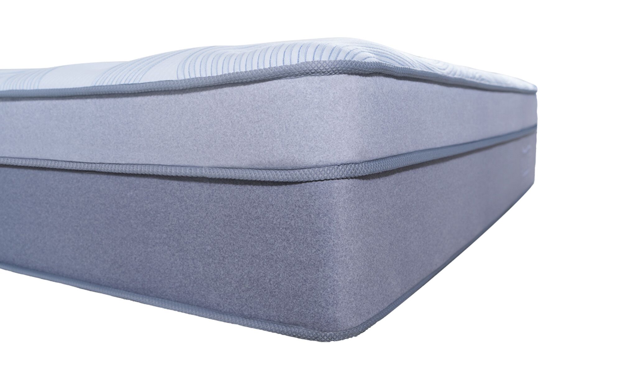 AIR COMFORT detalle Colchón Air Comfort de la marca Sauter tech, visto en detalle. Un diseño ergonómico de capas múltiples con tecnología Mini pocket springs, 5 zone pocket springs y una superficie acolchada.