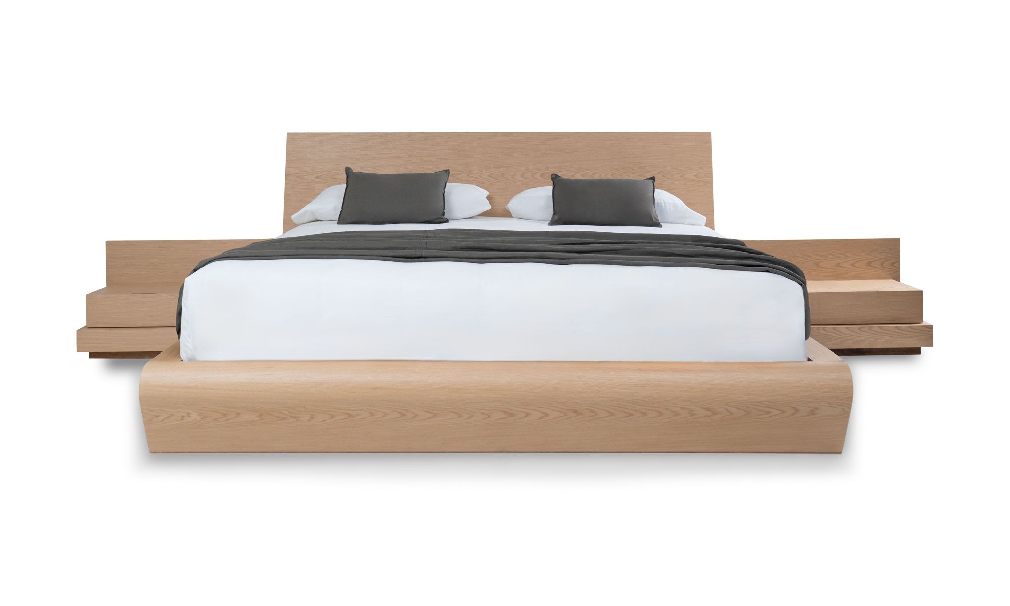 frente-con-nochero ESE Vista frontal de la Cama Ese con Nochero Oriental de la marca Aristas. Un diseño elegante y moderno que presenta una estructura minimalista de líneas limpias y curvas sutiles en roble europeo. Los nocheros del mismo estilo, complementan el conjunto.