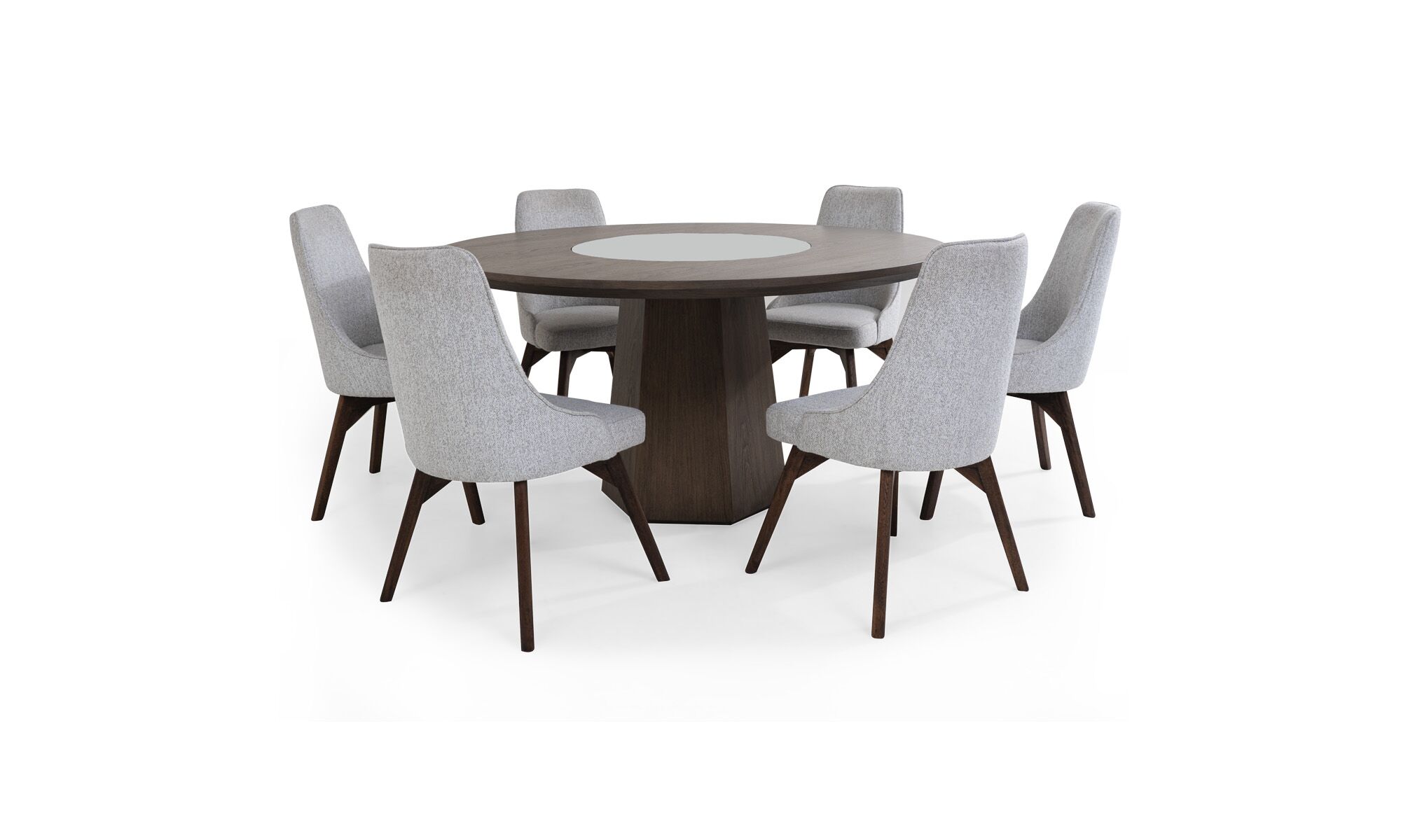 3,4 MILANO GIR VELA Vista frontal de la Mesa de Comedor Milano con plato giratorio y 6 sillas Vela de la marca Aristas. La mesa destaca por su diseño contmporáneo y moderno en roble europeo, con un plato giratorio central. Las sillas Vela, tienen un respaldo alto y un tapizado elegante en el color de tela Victoria Gris Hielo.