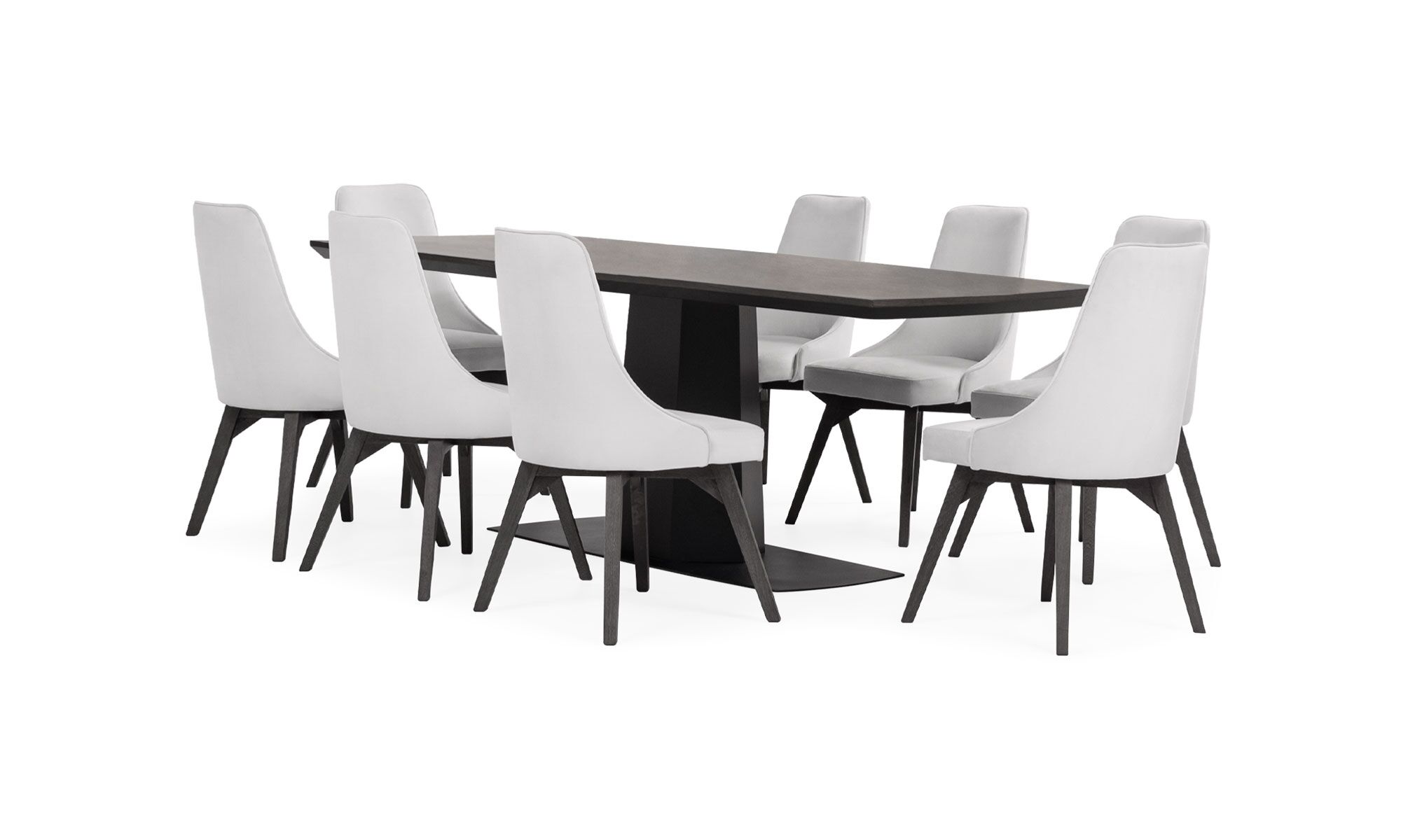 2.MESA-COMEDOR-NAPOLES-MADERA-8-SILLAS-VELA Vista diagonal de la Mesa Comedor Nápoles con 8 sillas Vela de la marca Aristas. La mesa tiene un diseño rectangular en madera, sostenida por una base robusta. Las sillas Vela presentan un respaldo alto, patas estilizadas y un tapizado en tela suave que complementa el conjunto.